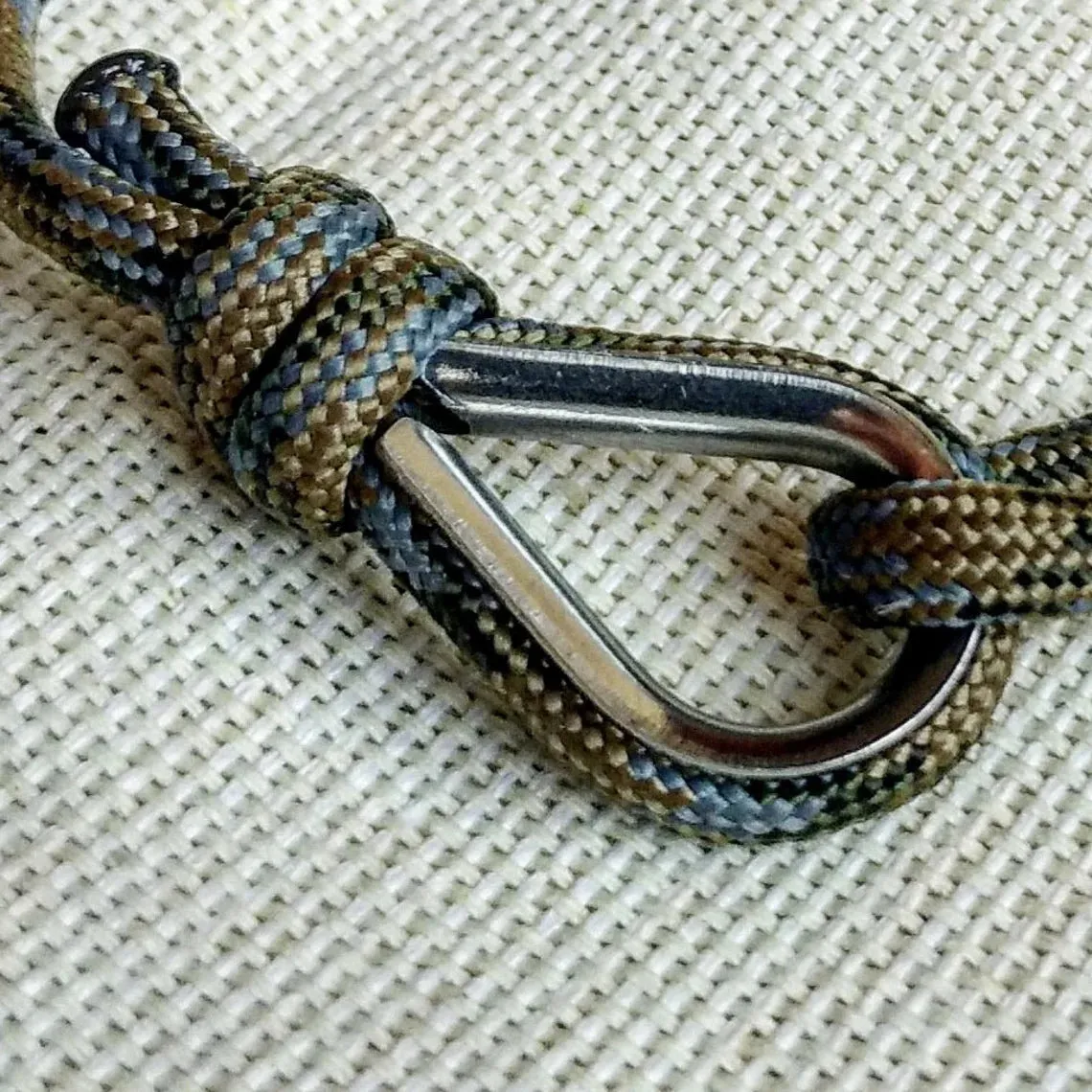 Camouflage thin bracelet made of paracord and Celtic knots. Stylish bracelet for men and women. A gift for a surfer, diver, skydiver.