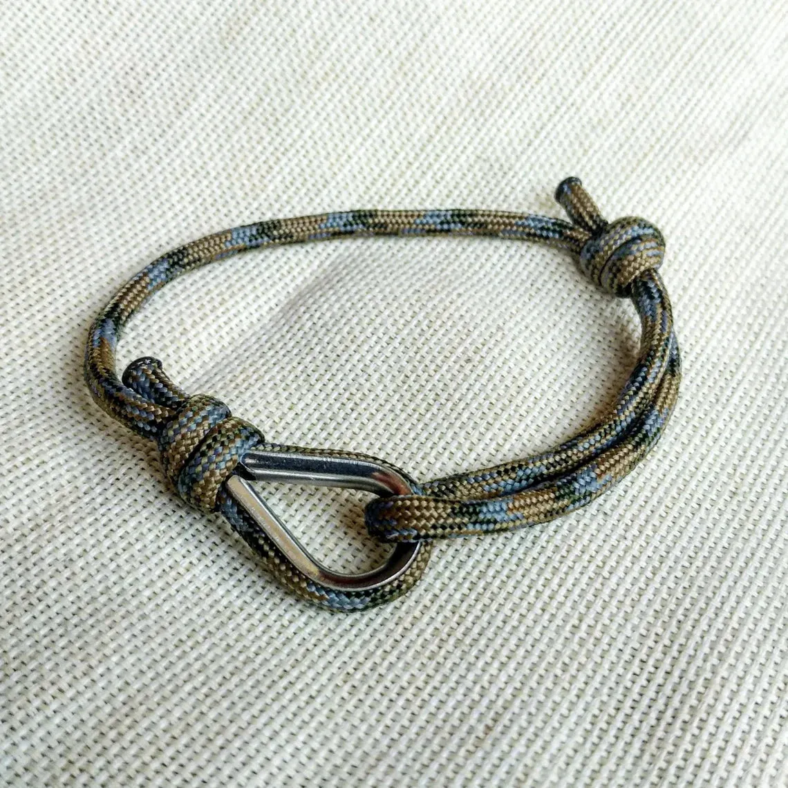 Camouflage thin bracelet made of paracord and Celtic knots. Stylish bracelet for men and women. A gift for a surfer, diver, skydiver.