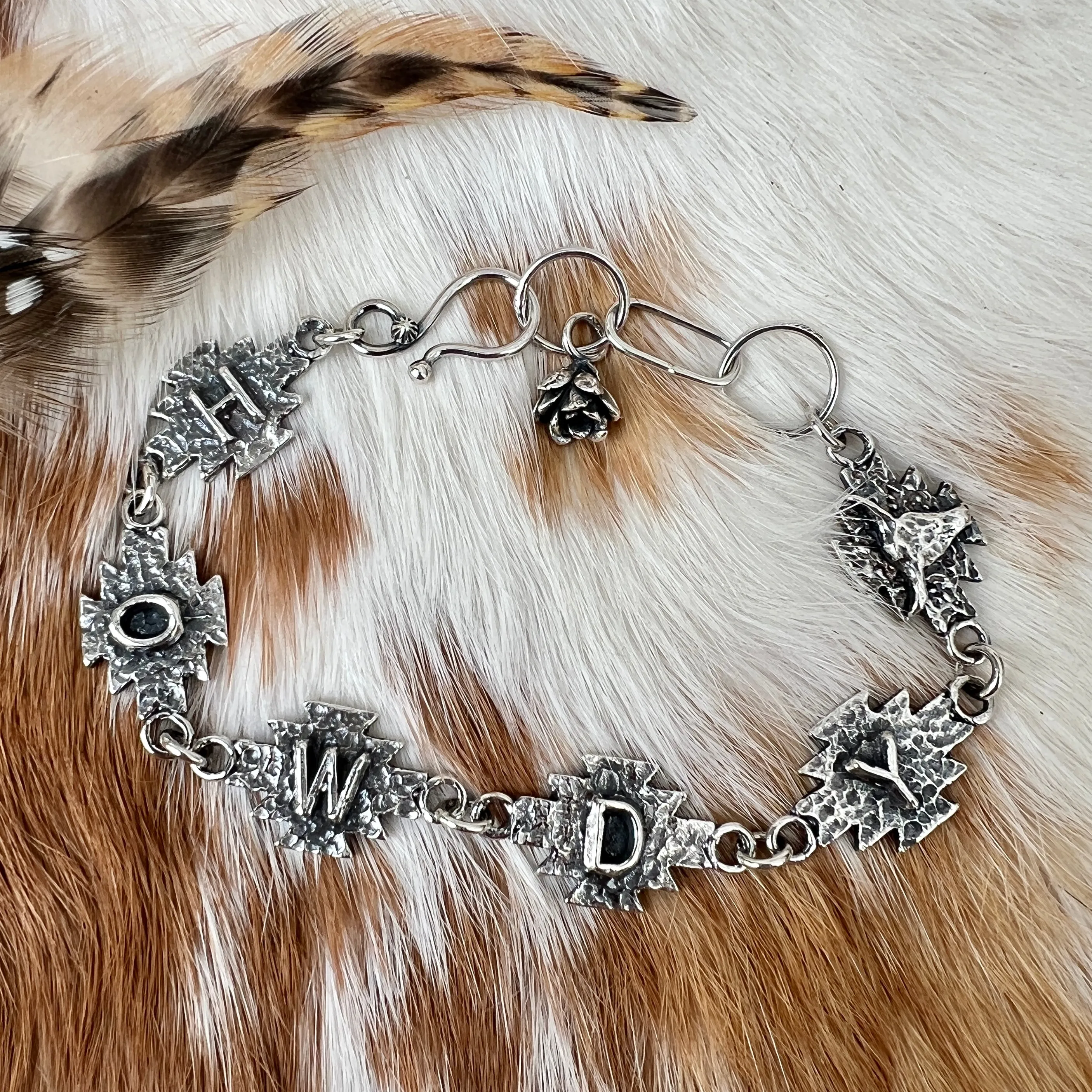 Howdy Cowgirl Aztec Sterling Silver hand carved bracelet