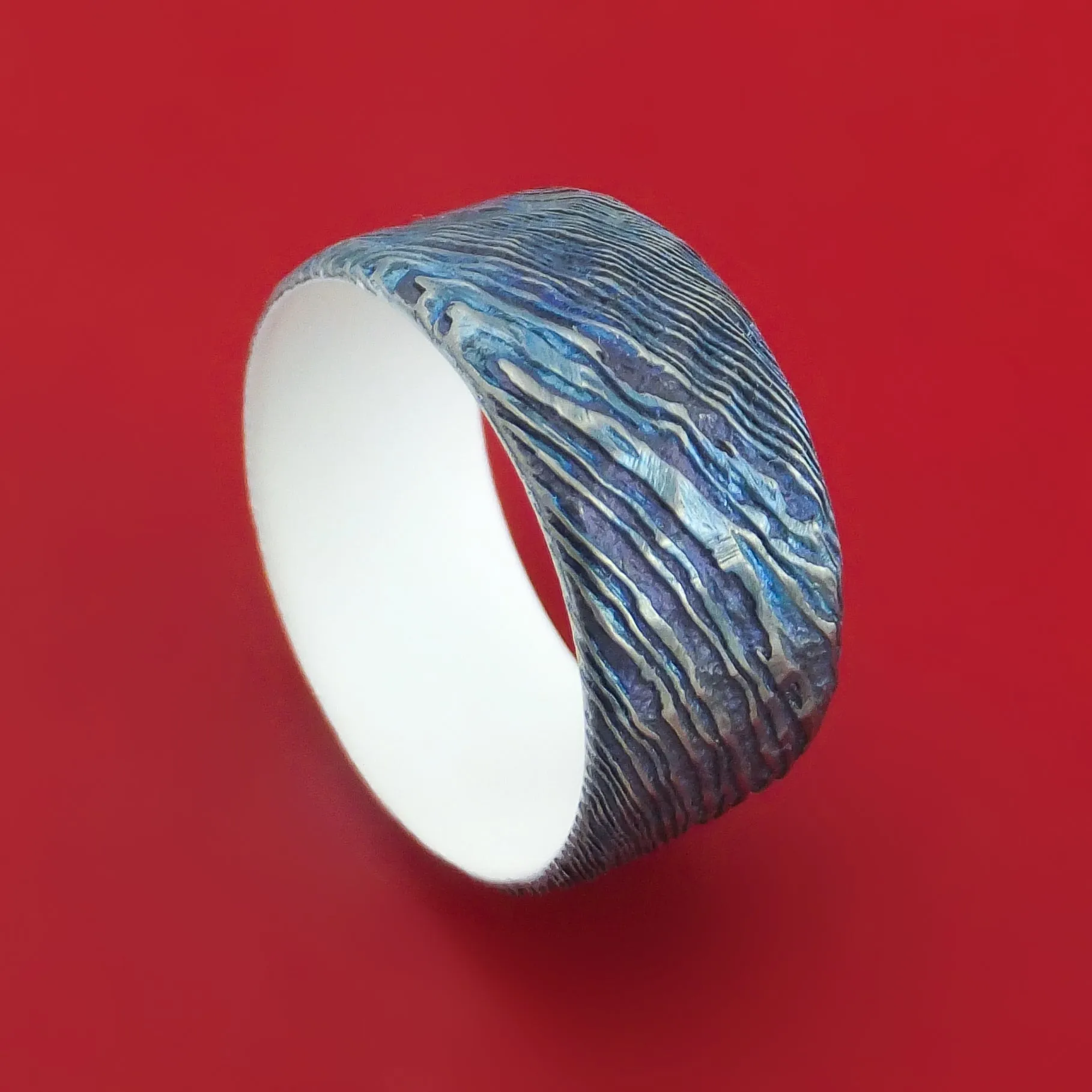 Kuro-Ti Twisted Titanium Etched and Heat-Treated Ring Rock Hammer Finish with Cerakote Sleeve Custom Made Band