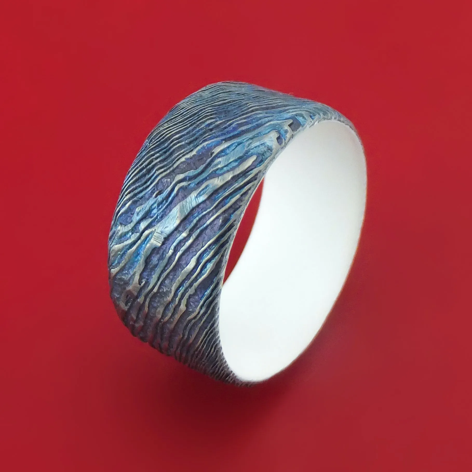 Kuro-Ti Twisted Titanium Etched and Heat-Treated Ring Rock Hammer Finish with Cerakote Sleeve Custom Made Band