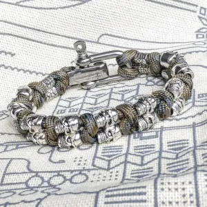 Steel skull paracord bracelet.  A great gift for men and women who prefer a brutal style and a symbol of the skull. Halloween gift.