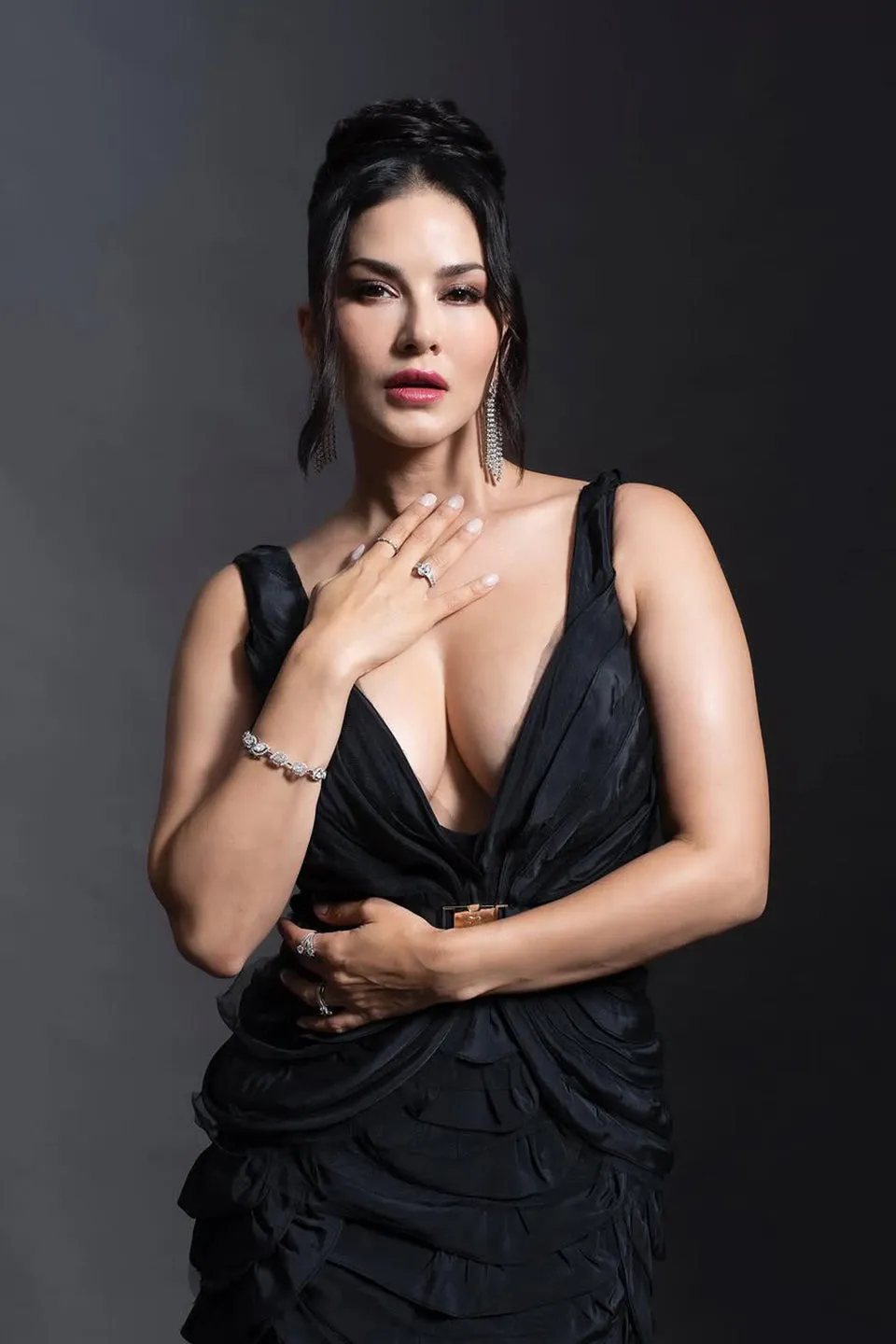 Sunny Leone in Deep v neckline flared gown
