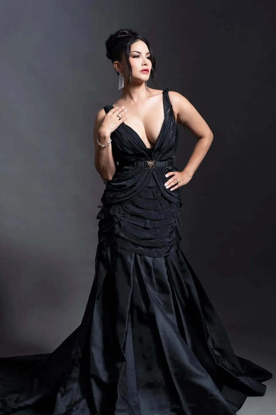 Sunny Leone in Deep v neckline flared gown