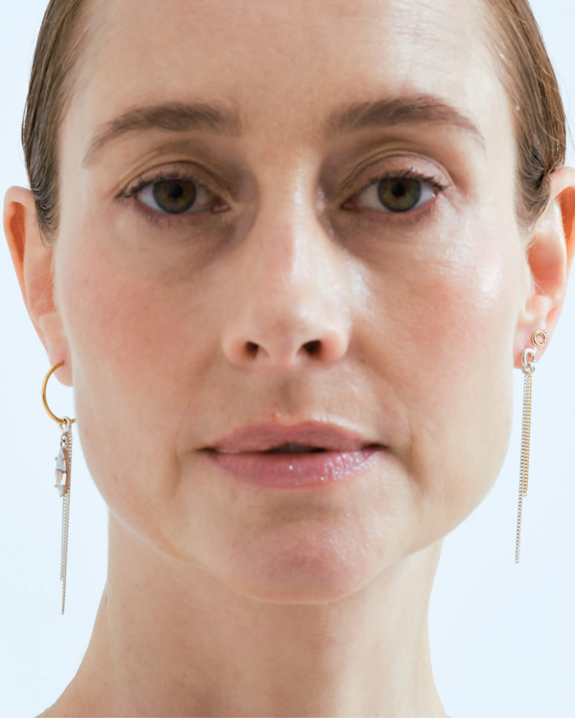 Trio of hoop and stud earrings with marquis crystal, spring ring and falling chains